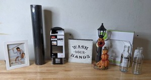 lot 307 image: Kitchen Decor National Tree Company 14 Pumpkin Scarecrow and Lamppost, Oxo Good Grips Box Grater, Food Network Dinner Plates, & More