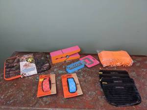 lot 330 image: Collection of Realtree Camo 10 Tablet Sleeve, Ruff Hewn LED Slap Lights, Bottle Opener and More - W