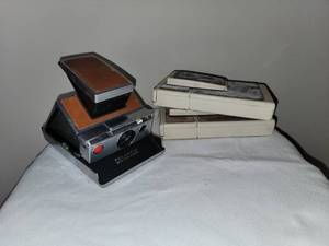 lot 114 image: Polaroid SX-70 Retro Camera Group