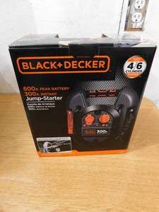 lot 28 image: BLACKDECKER 700 Peak Amp Portable Car Jump Starter with 12-Volt DC outlet and USB Power