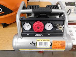 lot 58 image: Husky 1 Gal. Portable Electric-Powered Silent Air Compressor