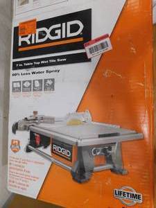 lot 65 image: RIDGID 6.5 Amp Corded 7 in. Table Top Wet Tile Saw