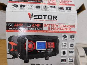 lot 74 image: Vector 12-Volt Automotive Portable Car Battery Charger with 50 Amp Engine Start and Alternator Check