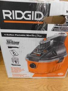 lot 83 image: RIDGID 4 Gal. 5.0-Peak HP Portable WetDry Shop Vacuum with Filter, Dust Bag, Locking Hose and Car Nozzle
