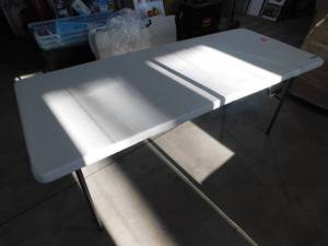 lot 114 image: HDX 72 in. Earth Tan Plastic Fold-in-Half Folding Utility Table