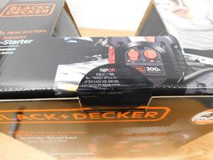 lot 29 image: BLACKDECKER 700 Peak Amp Portable Car Jump Starter with 12-Volt DC outlet and USB Power