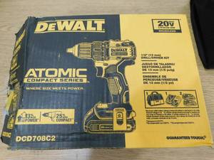 lot 124 image: DEWALT ATOMIC 20-Volt MAX Cordless Brushless Compact 12 in. DrillDriver, (2) 20-Volt 1.3Ah Batteries, Charger & Bag
