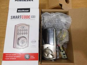 lot 142 image: Kwikset SmartCode 913 Satin Nickel Single Cylinder Electronic Deadbolt Featuring SmartKey Security