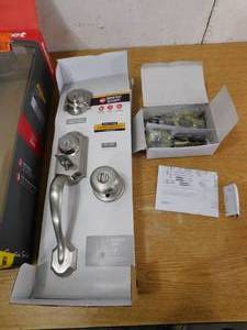 lot 143 image: Kwikset Montara Satin Nickel Single Cylinder Door Handleset with Juno Entry Door Knob Featuring SmartKey Security