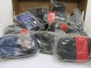 lot 13 image: Large Lot of Brand New Tumi DELTA Airlines Travel Cases wSupplies