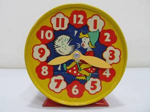 lot 16 image: Vintage 1950s Era Tin Clock Coin Bank