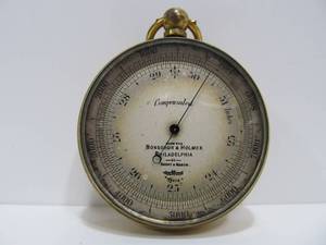 lot 68 image: Antique Short & Holmes Advertising Pocket Barometer for Bonschur & Holmes Opticians