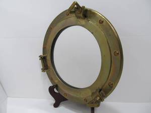 lot 117 image: Solid Brass Porthole Decor Mirror