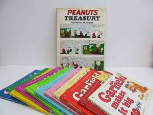 lot 136 image: Lot of GARFIELD Comic Strip Books & Peanuts Coffee Table Book