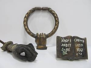 lot 229 image: 2 Antique Hand Door Knockers