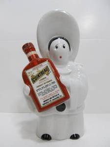 lot 167 image: Vintage Cointreau Figural Advertising Porcelain Decanter