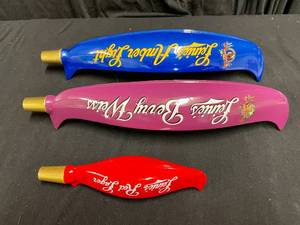 lot 156 image: Lot of 3 Leinies canoe tap handles Amber Light, Berry Weiss, and small Red Lager, NEW