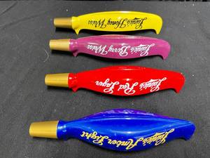 lot 157 image: Lot of 4 Leinies canoe tap handles Honey Weiss, Berry Weiss, Amber Light and Red Lager, NEW