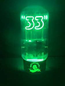 lot 79 image: Rolling Rock 33, old radio tube neon