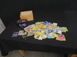 TIN POKEMON CONTAINER AND CARDS
