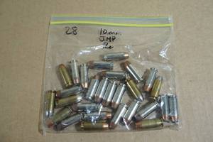 lot 61 image: 28 Reloaded 10mm JHP Ammo