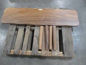 Solid Wood Live Edge Walnut Bench  With 4 Wood Legs.  Approximate Dimensions 60 x 15 x 1.96 - Large Scratch and Slight Dents, Slight mold growth from sitting in warehouse (can be sandedremoved) NO RESERVE