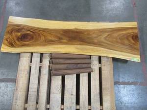 Solid Wood Live Edge Walnut Bench  With 4 Wood Legs.  Approximate Dimensions 60 x 15 x 1.96 - Large Scratch and Slight Dents, Slight mold growth from sitting in warehouse (can be sandedremoved) NO RESERVE