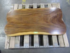 Solid Wood Live Edge Walnut Coffee Table. TOP ONLY  Approximate Dimensions 48 x 25 x 2 - Slight Scratch and Dent, Slight mold growth from sitting in warehouse (can be sandedremoved) NO RESERVE