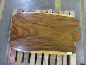 Solid Wood Live Edge Walnut Coffee Table. TOP ONLY  Approximate Dimensions 48 x 25 x 2 - Slight Scratch and Dent, Slight mold growth from sitting in warehouse (can be sandedremoved) NO RESERVE