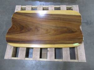 Solid Wood Live Edge Walnut Coffee Table. TOP ONLY  Approximate Dimensions 48 x 25 x 2 - Slight Scratch and Dent, Slight mold growth from sitting in warehouse (can be sandedremoved) NO RESERVE