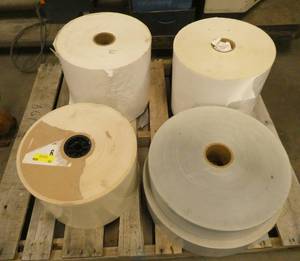 Large rolls of peel and stick paper that is printable - the 2 larger rolls are white vinyl like and are 13-14 wide, the two shortest are silver color and are 4 and 5 wide
