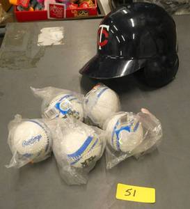5 new Rawlings baseballs and a Twins hat that is a radio