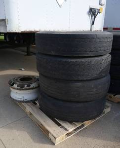FOUR Semi tires 11R22.5  144142L  radial various brands - only about 25% but all held air, good for storage trailers, misc farm equipment