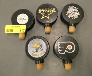 FIVE hockey puck wine stoppers