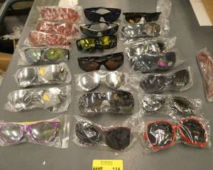 23 Pair of adult sunglasses