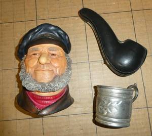 Old Man of the Sea, pipe case and tin cup