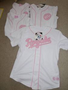 FOUR girls baseball jerseys size 1214 and 16, 3 Cubs and 1 Royals