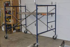Like New complete section of Metaltech scaffolding includes braces, plank and 4 castor wheels