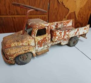 lot 8 image: Early Model Tonka Stake Truck and a Buddy L Ride-on-Truck Missing Seat