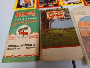 lot 13 image: 1946 Farm-Oyl Pocket Ledger, SD Fertilizers Pocket Ledger, 12 WCW Trading Cards