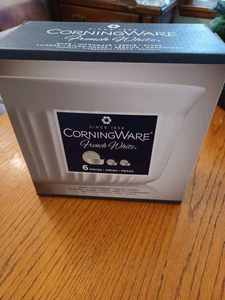 lot 63 image: New 6-Piece Set of French White Corning Ware in Original Box and a New Round Porcelain Cannister Set
