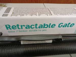 lot 89 image: One New and Two Used Retractable Gates for IndoorOutdoor Use and Suitable for Toddlers and Pets