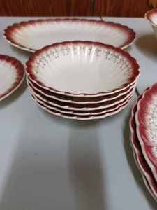 lot 90 image: Partial Set of 27 Pieces of American Limoges Mandarin-Maroon Set of Dishes - Warranted 22k Gold Design