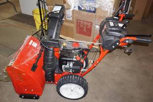 lot 75 image: NEW Troy-Bilt 24 Storm 2440 Two Stage Gas Snow Blower