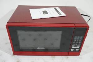 lot 112 image: Sunbeam .7 Cu Ft Red Microwave