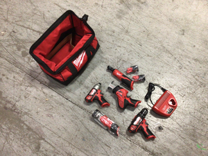 M12 12-Volt Lithium-Ion Cordless Combo Tool Kit with Two 1.5 Ah Batteries, 1 Charger, 1 Tool Bag (4-Tool) by Milwaukee Customer Returns See Pictures