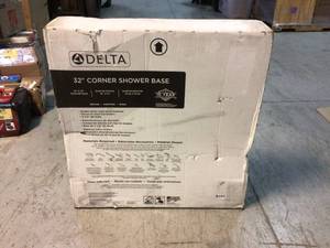 lot 25 image: Delta Foundations 32 in. L x 32 in. W Corner Shower Pan Base with Center Drain in White Customer Returns See Pictures