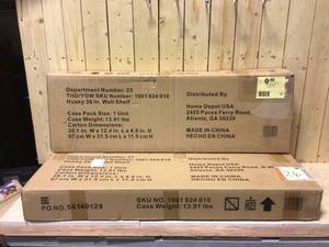 lot 26 image: Husky Steel Garage Wall Shelf in Black (36 in. W x 9 in. H x 9 in. D) Customer Returns See Pictures
