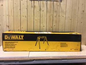lot 27 image: DEWALT 15.4 lbs. Heavy Duty Work Stand with Miter Saw Mounting Brackets Customer Returns See Pictures