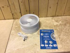 lot 79 image: 2-in-1 Adjustable Height 40 in. Unique Foldable and Portable My Foldaway Rechargeable Floor and Table Fan Customer Returns See Pictures